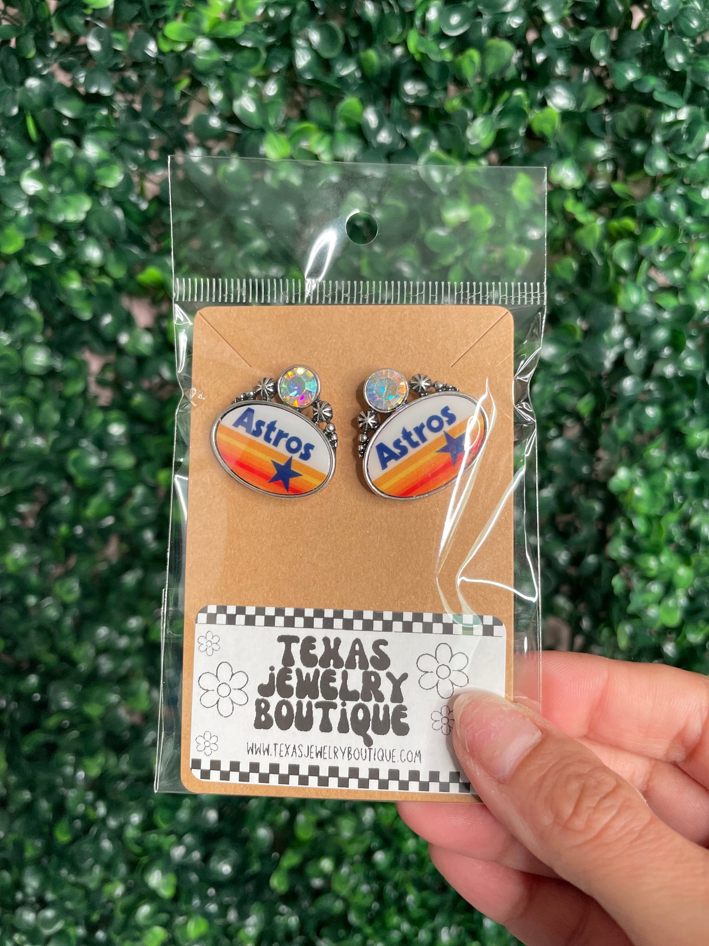 H town A oval rhinestone earrings